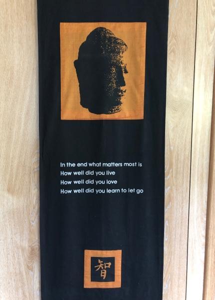 Photo of banner with quote about living, loving, and letting go | Seattle therapist