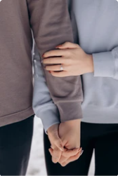 Couple holding hands, representing premarital counseling in Seattle
