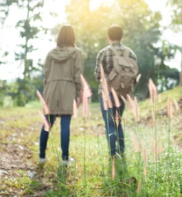 Couple walking together outdoors, representing couples therapy in Seattle