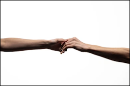 Two people reaching toward each other, representing intimacy and connection in sex therapy
