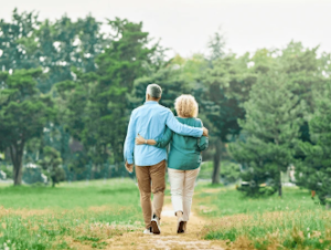 Older couple walking together, representing therapy for adults in midlife and beyond