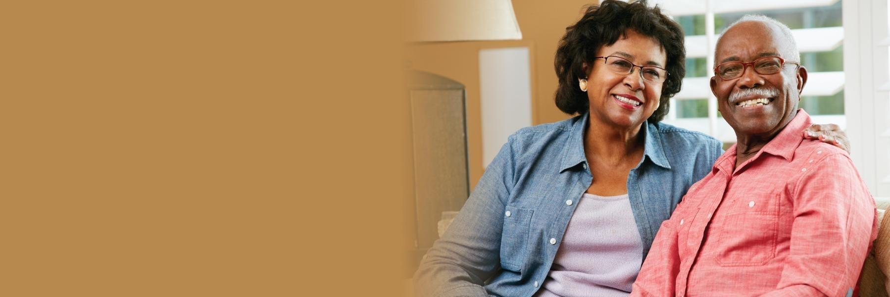 Couple sitting together on the couch | Clarity Counseling Seattle