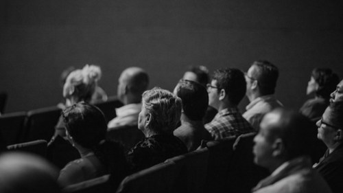 Students listening to panel discussion in Seattle