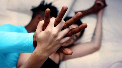  Couple in bed having intimacy