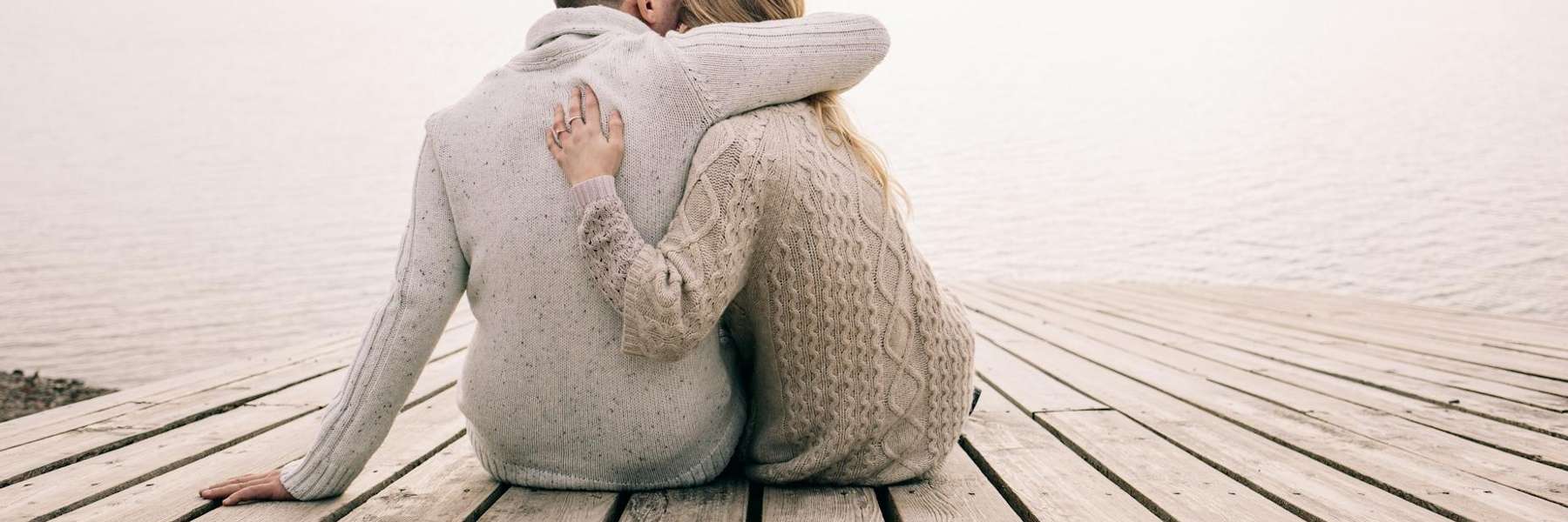 couple hugging on a porch | marriage counseling