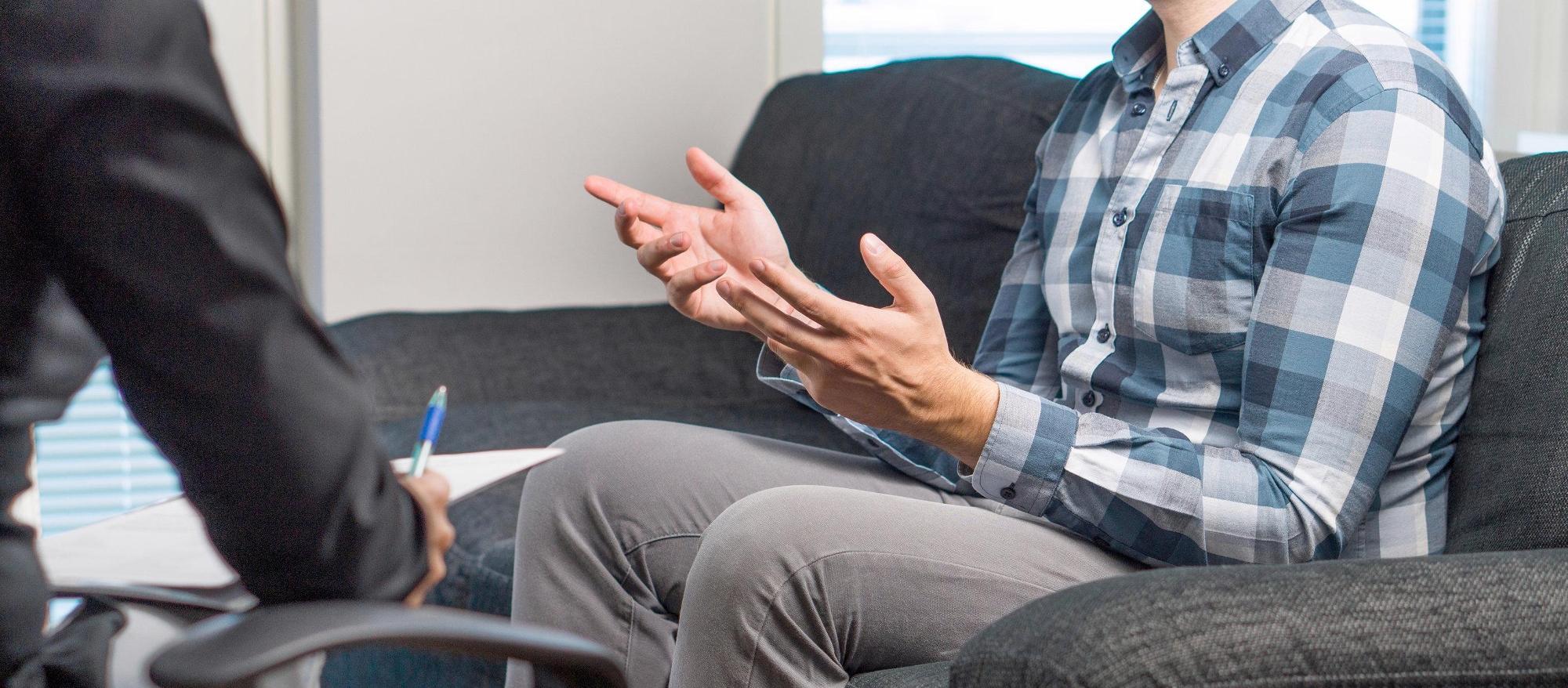 Person talking to couple's therapist in Seattle, WA