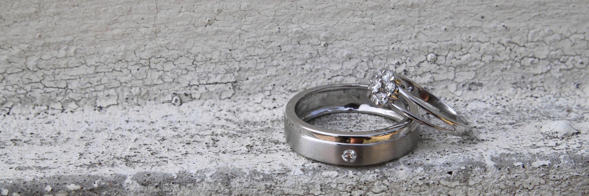 Wedding Rings on the ground outside of Seattle couples therapist office